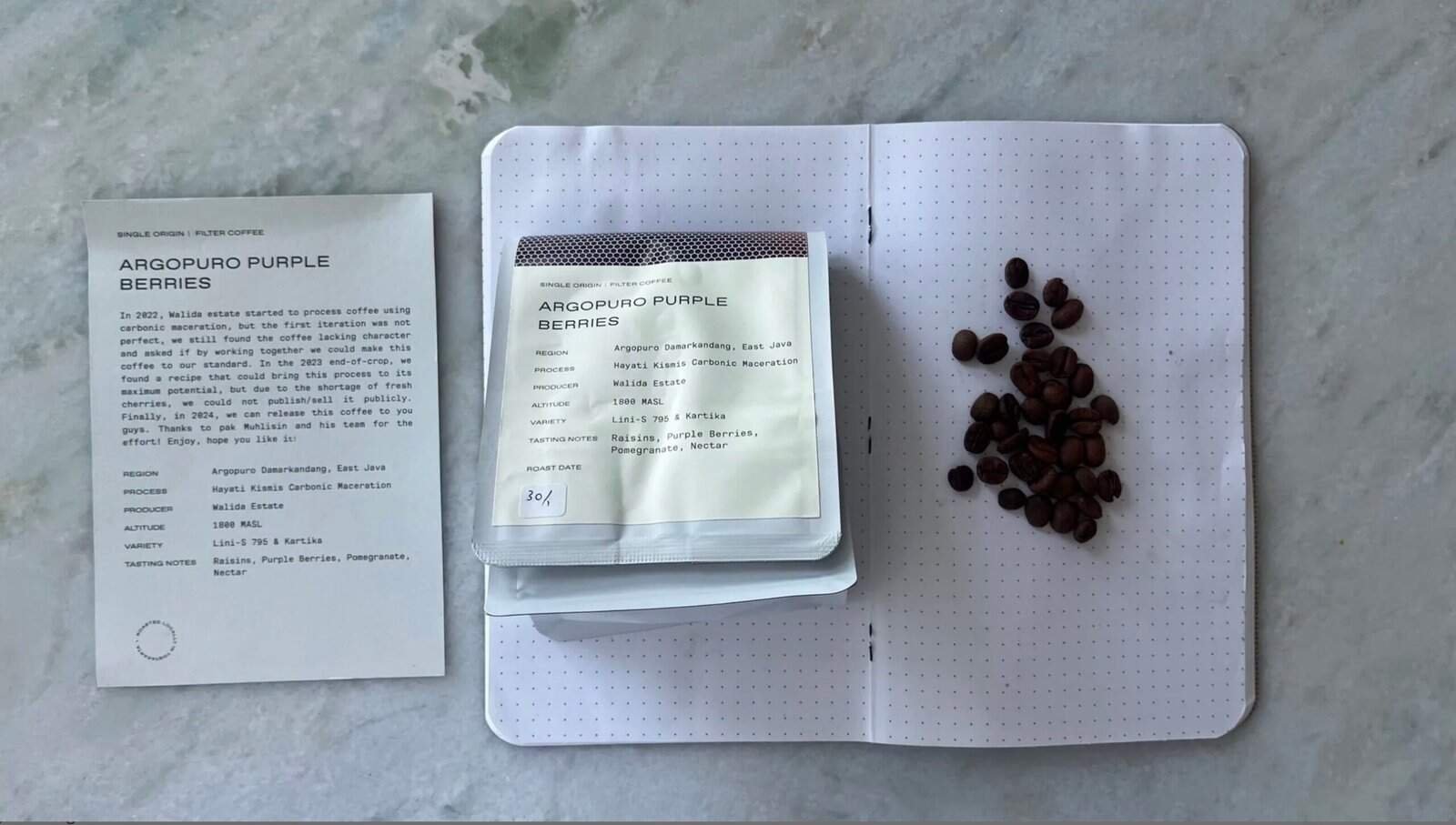 Rich coffee beans, coffee tasting notes, and a coffee bean package for Argopuro Purple Berries coffee from Bali, Indonesia. Showcases premium coffee tasting experience and high-quality bean selection.