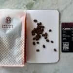 Rich coffee beans from Indonesia's Flores region, showcased for specialty coffee lovers by Barnaby Robson, with tasting notes of strawberry cream, apricot, red apple, and honey.