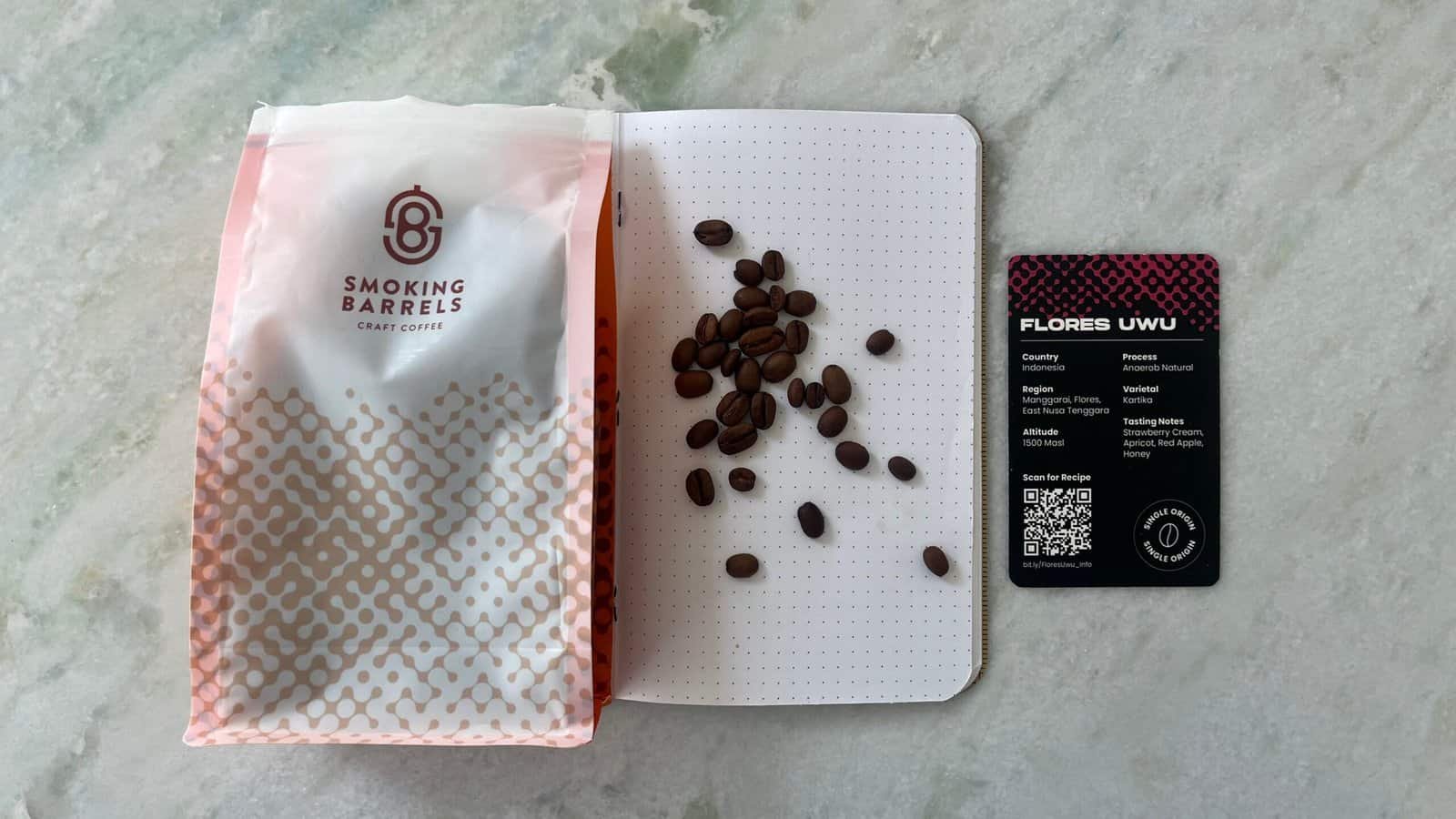 Rich coffee beans from Indonesia's Flores region, showcased for specialty coffee lovers by Barnaby Robson, with tasting notes of strawberry cream, apricot, red apple, and honey.